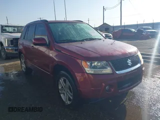 2007 Suzuki Grand Vitara Luxury z VIN JS3TE947474200491, wystawiony jako IAAI lot #42462678 z przebiegiem 230 007 mil mil oraz . Historia ofert i sprzedaży dostępna na DreamBid. Obrazek 1.