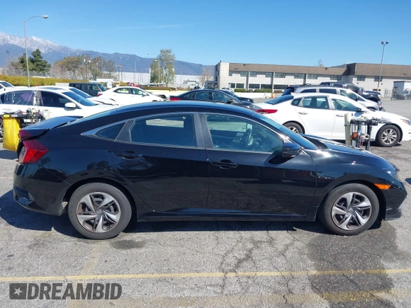 2020 Honda Civic LX z VIN 19XFC2F6XLE212683, wystawiony jako IAAI lot #41745743 z przebiegiem 81 553 mil mil oraz . Historia ofert i sprzedaży dostępna na DreamBid. Obrazek 14.