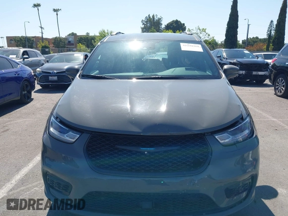 2021 Chrysler Pacifica Hybrid Limited z VIN 2C4RC1S76MR544495, wystawiony jako IAAI lot #42294312 z przebiegiem 89 083 mil mil oraz . Historia ofert i sprzedaży dostępna na DreamBid. Obrazek 12.