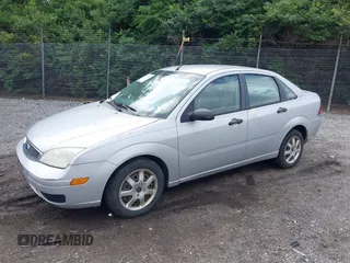 2005 Ford Focus S z VIN 1FAHP34N95W240955, wystawiony jako IAAI lot #42243013 z przebiegiem 251 204 mil mil oraz . Historia ofert i sprzedaży dostępna na DreamBid. Obrazek 12.