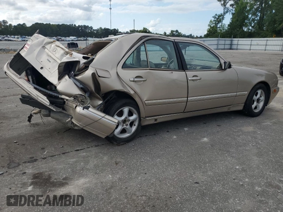 2001 Mercedes-Benz E-Class with VIN WDBJF70JX1B194075, listed as a Copart auction lot 70482944 with 218,319 mi miles and Salvage Title. Bid and sale history available at carsss.com. Image 3.