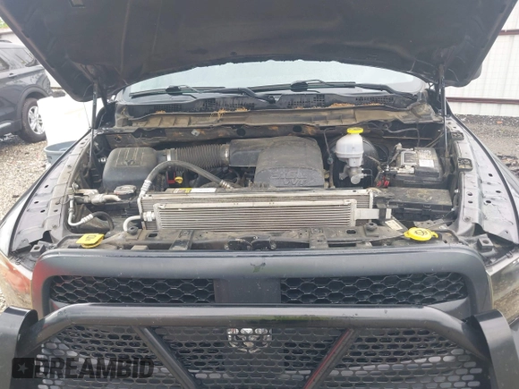 2022 Ram 1500 Tradesman z VIN 1C6RR6FG9NS222835, wystawiony jako IAAI lot #42156693 z przebiegiem 71 564 mil mil oraz . Historia ofert i sprzedaży dostępna na DreamBid. Obrazek 10.