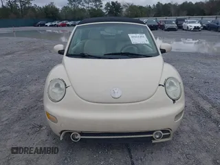 2004 Volkswagen Beetle with VIN 3VWCM21Y64M306721, listed as a IAAI auction lot 41611494 with 183,434 mi miles and . Bid and sale history available at DreamBid. Image 12.
