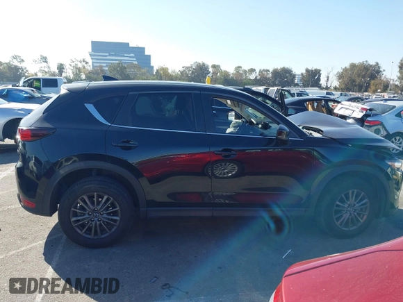 2017 Mazda CX-5 Touring with VIN JM3KFACL2H0146213, listed as a IAAI auction lot 41626112 with 77,829 mi miles and . Bid and sale history available at carsss.com. Image 13.