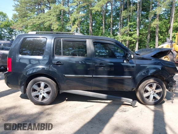 2013 Honda Pilot Touring with VIN 5FNYF3H96DB011470, listed as a IAAI auction lot 42535022 with 201,380 mi miles and . Bid and sale history available at DreamBid. Image 14.