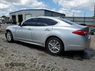 2012 Infiniti M Hybrid with VIN JN1EY1AP0CM910697, listed as a Copart auction lot 60821335 with 145,533 mi miles and Salvage title. Bid and sale history available at DreamBid. Image 2.