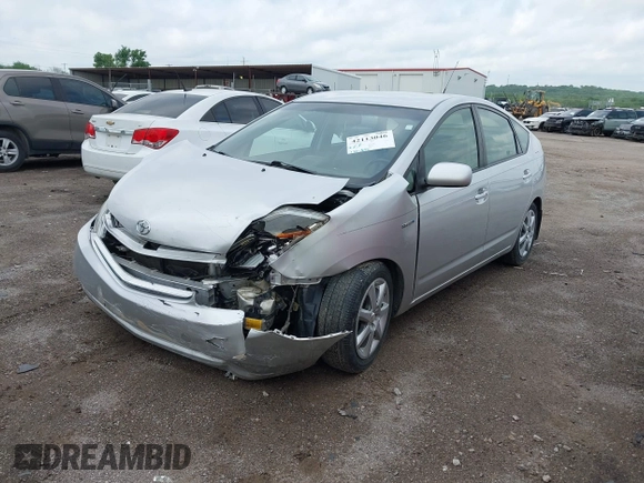 2007 Toyota Prius z VIN JTDKB20U873273942, wystawiony jako IAAI lot #42113046 z przebiegiem 126 635 mil mil oraz . Historia ofert i sprzedaży dostępna na DreamBid. Obrazek 2.