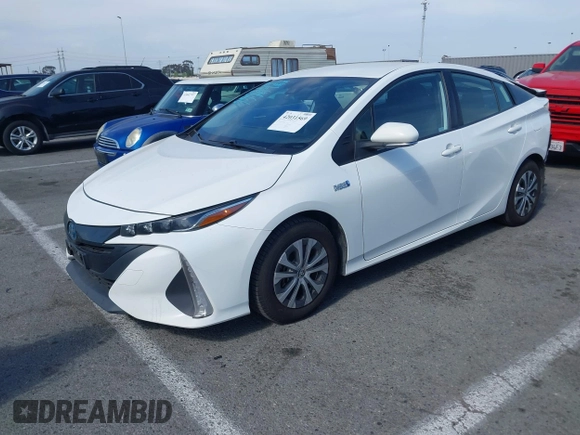 2021 Toyota Prius LE with VIN JTDKAMFP7M3197111, listed as a IAAI auction lot 42031569 with 240,098 mi miles and . Bid and sale history available at DreamBid. Image 18.
