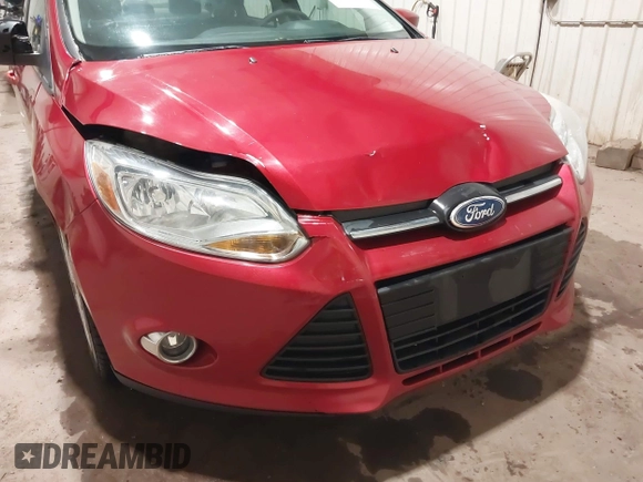 2012 Ford Focus SE z VIN 1FAHP3F21CL114445, wystawiony jako IAAI lot #42277986 z przebiegiem 89 317 mil mil oraz . Historia ofert i sprzedaży dostępna na DreamBid. Obrazek 17.