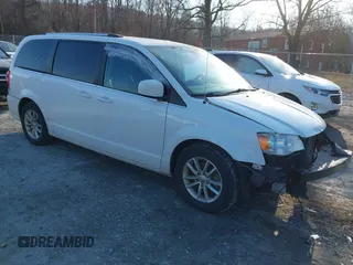2019 Dodge Grand Caravan SXT with VIN 2C4RDGCG2KR775177, listed as a IAAI auction lot 41363146 with 129,739 mi miles and . Bid and sale history available at DreamBid. Image 1.
