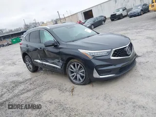 2020 Acura RDX Technology with VIN 5J8TC2H50LL003615, listed as a IAAI auction lot 41427217 with 61,952 mi miles and . Bid and sale history available at DreamBid. Image 1.