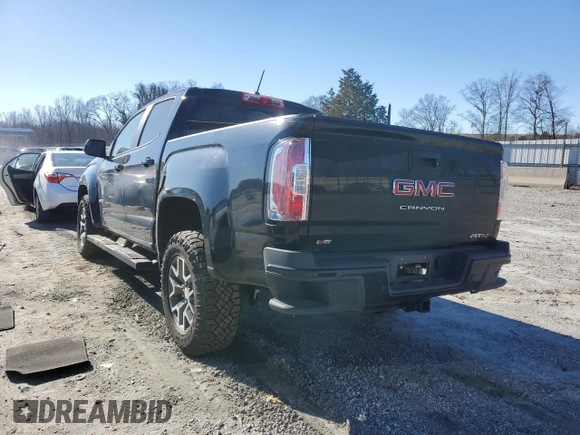 2021 GMC Canyon 4WD AT4 w/Leather with VIN 1GTG6FEN4M1155641, listed as a Copart auction lot 86793644 with 36,940 mi miles and Salvage Title. Bid and sale history available at carsss.com. Image 2.