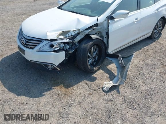 2015 Hyundai Azera z VIN KMHFG4JG3FA447672, wystawiony jako IAAI lot #42474930 z przebiegiem 125 425 mil mil oraz . Historia ofert i sprzedaży dostępna na DreamBid. Obrazek 6.