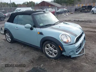2013 MINI Convertible with VIN WMWZN3C53DT135427, listed as a IAAI auction lot 41954817 with 57,029 mi miles and . Bid and sale history available at DreamBid. Image 1.