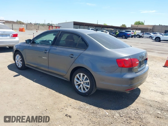 2011 Volkswagen Jetta SE with VIN 3VWDZ7AJ6BM392678, listed as a IAAI auction lot 42828544 with 128,706 mi miles and . Bid and sale history available at DreamBid. Image 3.
