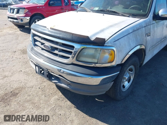 2002 Ford F-150 XL with VIN 1FTRX17272NA51467, listed as a IAAI auction lot 42095907 with 1 mi miles. Bid and sale history available at carsss.com. Image 6.