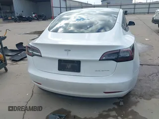 2021 Tesla Model 3 Long Range with VIN 5YJ3E1EB9MF059554, listed as a IAAI auction lot 41231520 with 63,696 mi miles and . Bid and sale history available at DreamBid. Image 15.