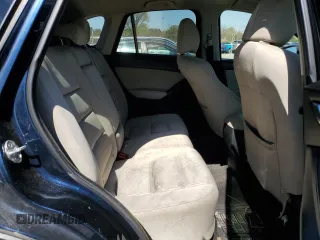 2014 Mazda CX-5 Touring with VIN JM3KE4CY4E0407868, listed as a Copart auction lot 52564315 with 137,989 mi miles and Salvage Title. Bid and sale history available at carsss.com. Image 11.