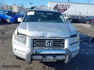 2006 Honda Ridgeline RTL with VIN 2HJYK165X6H570027, listed as a IAAI auction lot 41868389 with 207,020 mi miles. Bid and sale history available at carsss.com. Image 6.