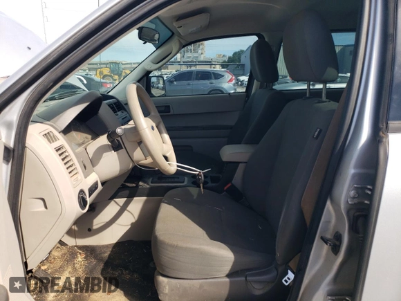 2012 Ford Escape XLS with VIN 1FMCU0C70CKA83668, listed as a Copart auction lot 61737275 with 245,744 mi miles and Salvage title. Bid and sale history available at DreamBid. Image 7.