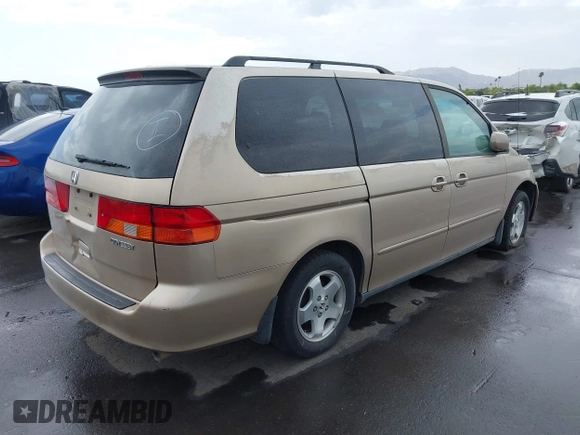 1999 Honda Odyssey EX z VIN 2HKRL1867XH535563, wystawiony jako IAAI lot #42188335 z przebiegiem 198 322 mil mil oraz . Historia ofert i sprzedaży dostępna na DreamBid. Obrazek 4.