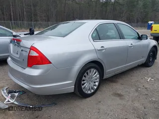 2010 Ford Fusion Hybrid with VIN 3FADP0L33AR185509, listed as a IAAI auction lot 41798825 with 155,934 mi miles. Bid and sale history available at carsss.com. Image 4.