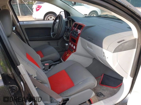 2007 Dodge Caliber SXT with VIN 1B3HB48B57D159305, listed as a IAAI auction lot 42095938 with 120,684 mi miles and . Bid and sale history available at DreamBid. Image 5.