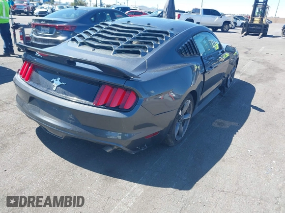 2015 Ford Mustang V6 with VIN 1FA6P8AM9F5396663, listed as a IAAI auction lot 41824725 with 91,403 mi miles and . Bid and sale history available at DreamBid. Image 4.