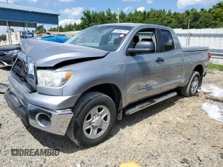 2010 Toyota Tundra z VIN 5TFRM5F19AX020409, wystawiony jako Copart lot #65938114 z przebiegiem 122 270 mil mil oraz Czysty tytuł • Clean title. Historia ofert i sprzedaży dostępna na DreamBid. Obrazek 1.