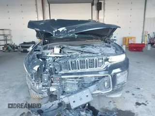 2023 Jeep Grand Cherokee Overland with VIN 1C4RJHDG5PC507978, listed as a IAAI auction lot 41394199 with 57,323 mi miles and . Bid and sale history available at DreamBid. Image 12.