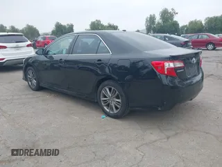 2014 Toyota Camry L with VIN 4T1BF1FK2EU816743, listed as a IAAI auction lot 42047519 with 266,904 mi miles. Bid and sale history available at carsss.com. Image 3.