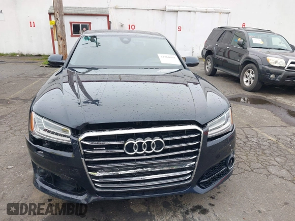 2017 Audi A8 L Sport with VIN WAU43AFD1HN007334, listed as a IAAI auction lot 41760035 with 67,342 mi miles. Bid and sale history available at carsss.com. Image 12.