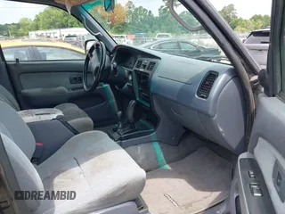 2000 Toyota 4Runner SR5 z VIN JT3HN86RXY0308057, wystawiony jako IAAI lot #42388038 z przebiegiem 261 007 mil mil oraz . Historia ofert i sprzedaży dostępna na DreamBid. Obrazek 5.