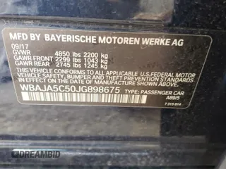 2018 BMW 5 Series 530i z VIN WBAJA5C50JG898675, wystawiony jako Copart lot #51188145 z przebiegiem Nie podano mil oraz Szkody całkowita. Historia ofert i sprzedaży dostępna na DreamBid. Obrazek 14.
