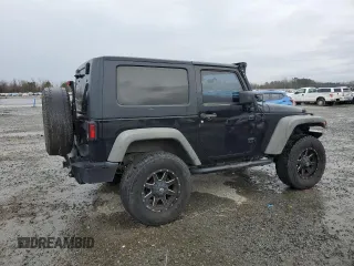 2009 Jeep Wrangler X with VIN 1J4FA241X9L735743, listed as a Copart auction lot 48109455 with 232,110 mi miles and Salvage Title. Bid and sale history available at DreamBid. Image 3.