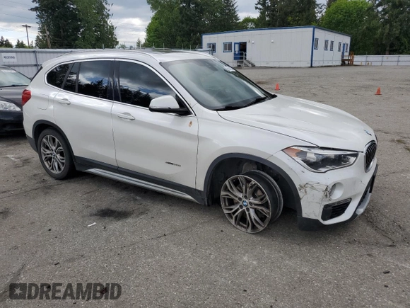 2016 BMW X1 xDrive28i z VIN WBXHT3C30G5E54396, wystawiony jako Copart lot #56042815 z przebiegiem 101 632 mil mil oraz Szkoda całkowita • Salvage title. Historia ofert i sprzedaży dostępna na DreamBid. Obrazek 4.