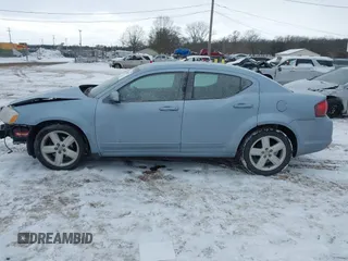 2013 Dodge Avenger SXT with VIN 1C3CDZCB9DN637114, listed as a IAAI auction lot 41613457 with 138,766 mi miles and . Bid and sale history available at carsss.com. Image 14.