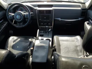 2012 Jeep Liberty Sport with VIN 1C4PJMAK5CW182377, listed as a Copart auction lot 57671345 with 140,236 mi miles and Salvage title. Bid and sale history available at DreamBid. Image 8.
