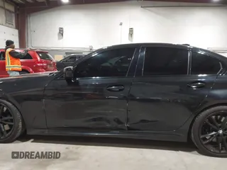 2021 BMW 3 Series M340i xDrive z VIN 3MW5U9J09M8B91584, wystawiony jako IAAI lot #42203384 z przebiegiem 42 688 mil mil oraz . Historia ofert i sprzedaży dostępna na DreamBid. Obrazek 19.