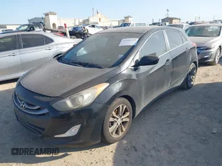2014 Hyundai Elantra GT with VIN KMHD35LH3EU234636, listed as a IAAI auction lot 41998223 with 213,434 mi miles. Bid and sale history available at carsss.com. Image 6.