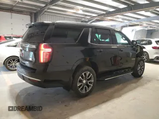 2022 Chevrolet Tahoe LS z VIN 1GNSKMKD8NR330151, wystawiony jako Copart lot #57070205 z przebiegiem 61 531 mil mil oraz Szkoda całkowita • Salvage title. Historia ofert i sprzedaży dostępna na DreamBid. Obrazek 3.