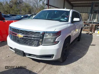2018 Chevrolet Tahoe Commercial z VIN 1GNLCDEC0JR283440, wystawiony jako IAAI lot #41280493 z przebiegiem 241 531 mil mil oraz . Historia ofert i sprzedaży dostępna na DreamBid. Obrazek 2.