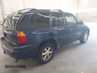2003 GMC Envoy SLE with VIN 1GKDT13SX32365522, listed as a IAAI auction lot 42655399 with 210,765 mi miles and . Bid and sale history available at DreamBid. Image 4.