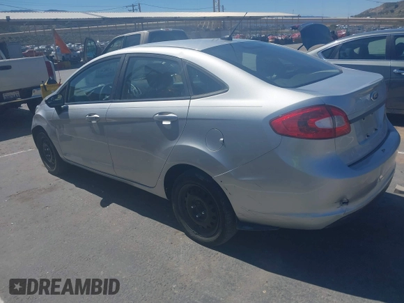 2013 Ford Fiesta S with VIN 3FADP4AJ0DM195196, listed as a IAAI auction lot 41817500 with 124,662 mi miles and . Bid and sale history available at DreamBid. Image 3.