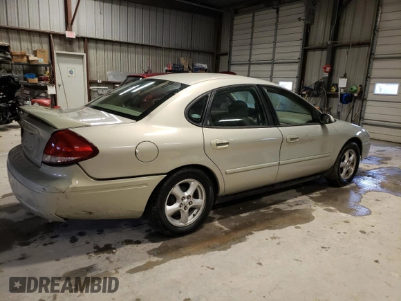 2004 Ford Taurus SE with VIN 1FAFP53U74G122231, listed as a Copart auction lot 42904044 with 116,851 mi miles and Salvage Title. Bid and sale history available at DreamBid. Image 3.