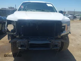 2018 Ford F-150 XL with VIN 1FTEW1EP8JKF82063, listed as a IAAI auction lot 42299414 with 153,706 mi miles and . Bid and sale history available at DreamBid. Image 6.