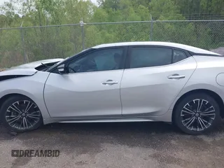 2016 Nissan Maxima SV z VIN 1N4AA6AP1GC904065, wystawiony jako IAAI lot #41930372 z przebiegiem 172 376 mil mil oraz . Historia ofert i sprzedaży dostępna na DreamBid. Obrazek 15.