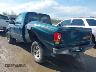 1998 Mazda B-Series Truck SX with VIN 4F4YR12C4WTM03287, listed as a IAAI auction lot 42182560 with 94,609 mi miles and . Bid and sale history available at DreamBid. Image 3.
