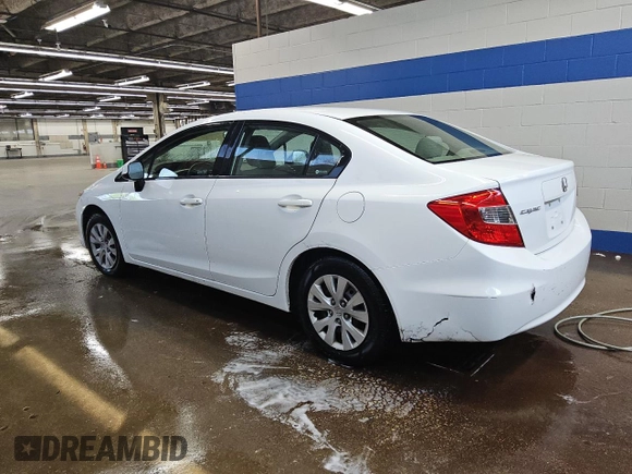 2012 Honda Civic LX z VIN 2HGFB2F50CH310377, wystawiony jako Copart lot #54486415 z przebiegiem 120 805 mil mil oraz Czysty tytuł • Clean title. Historia ofert i sprzedaży dostępna na DreamBid. Obrazek 2.