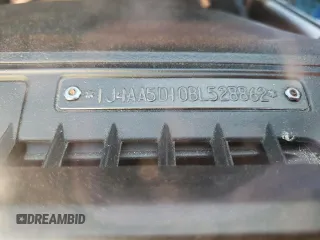 2011 Jeep Wrangler Sahara z VIN 1J4AA5D10BL528862, wystawiony jako Copart lot #53488515 z przebiegiem 198 865 mil mil oraz Szkoda całkowita • Salvage title. Historia ofert i sprzedaży dostępna na DreamBid. Obrazek 12.